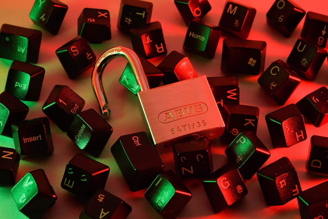 Open padlock and computer keyboard keys representing malware cleanup and account security