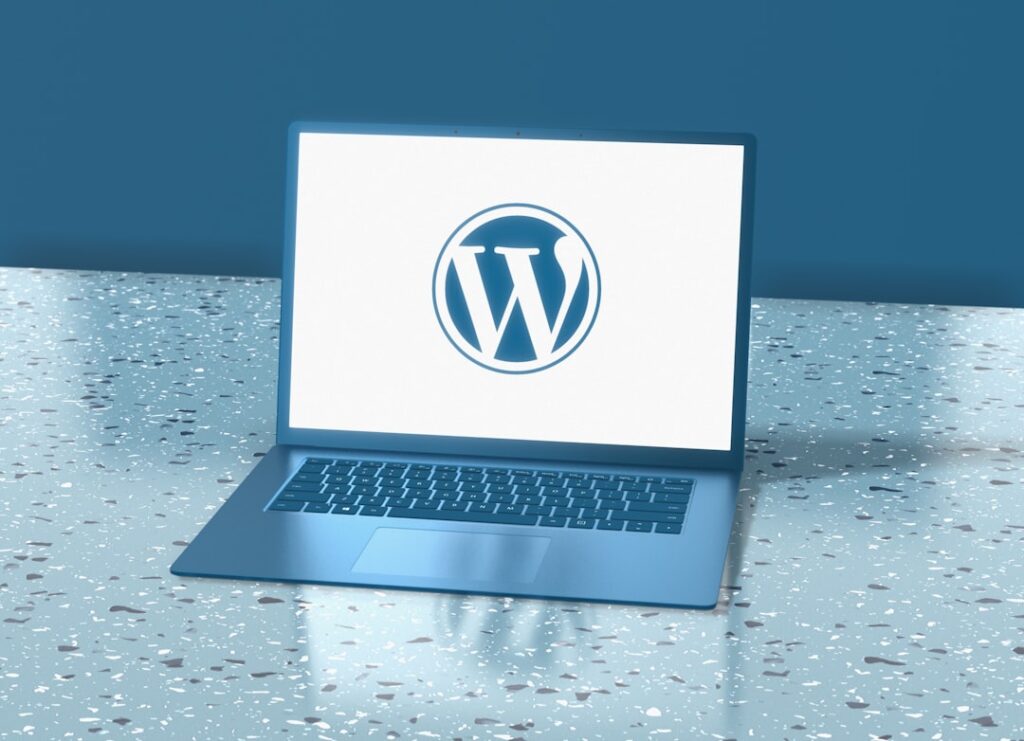 WordPress website on a laptop representing a modern plugin stack for SEO security backups and performance