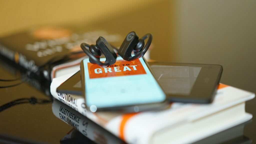 Headphones and reading device for an audiobook and reading subscription guide