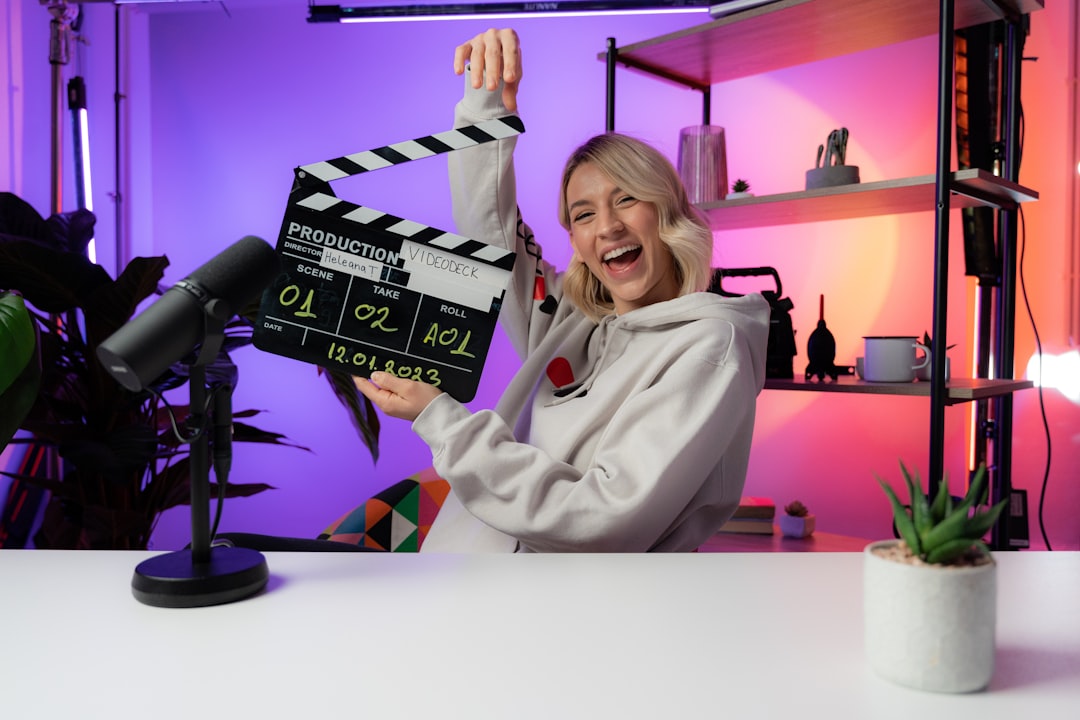 Video creator in a studio with camera and lighting equipment