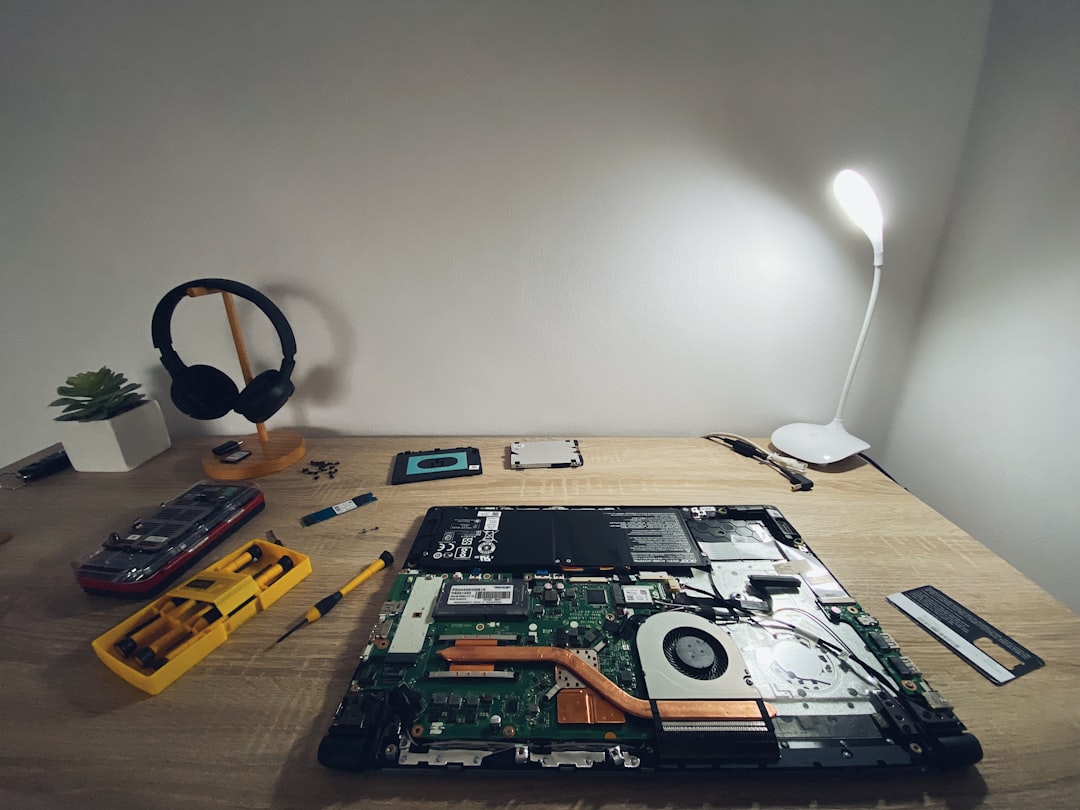 Computer opened for maintenance and upgrade work at a repair bench