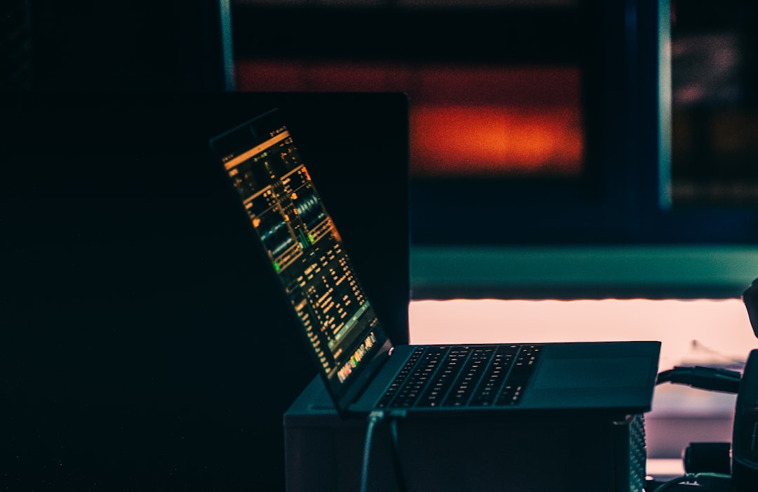 Laptop on a desk used to compare AI assistants for writing, research and file tasks