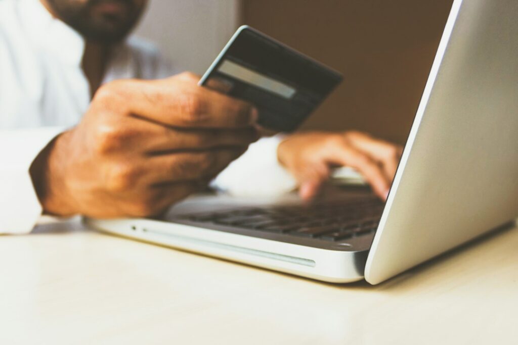 Online shopping and payment on a laptop for an e-commerce platform guide