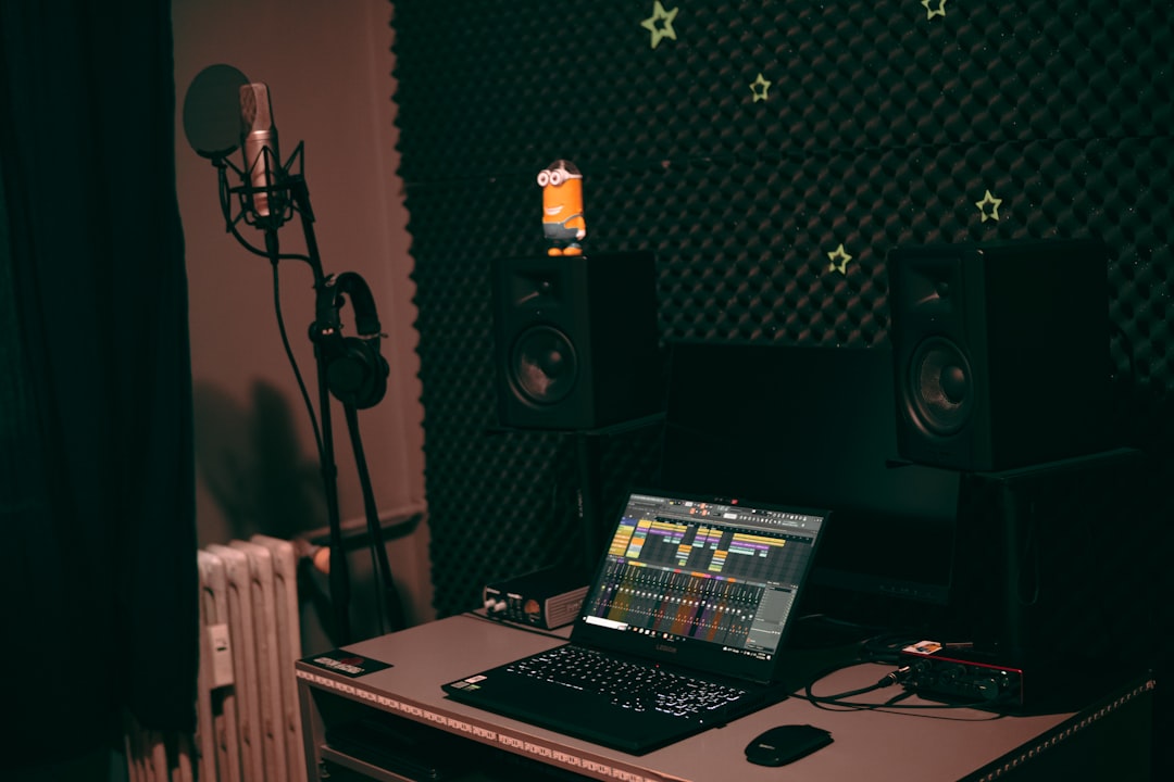 Laptop and microphone workspace for streaming and home studio recording