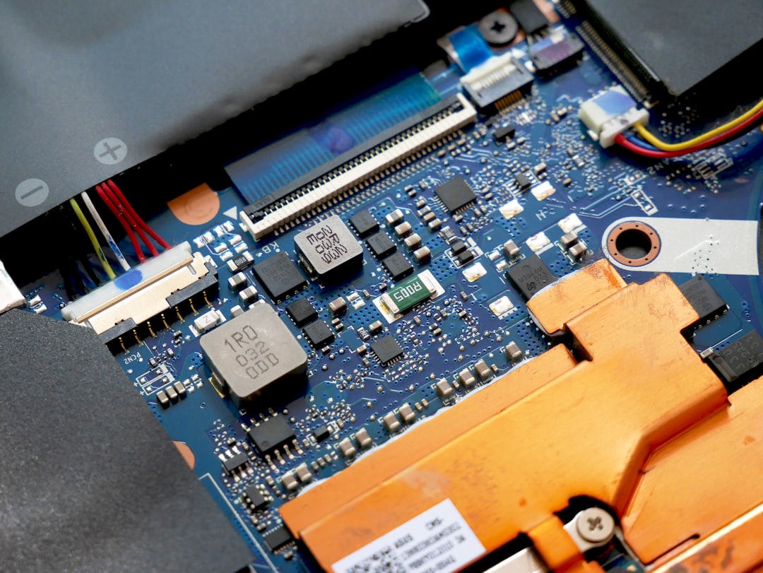 Laptop motherboard showing modern processor hardware used in AI-capable PCs