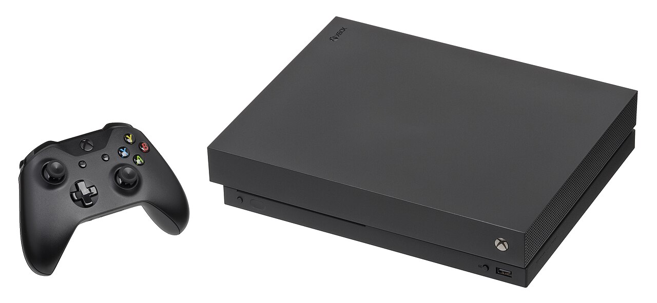 Microsoft Xbox One X console and controller for 2026 legacy console versus gaming PC comparison