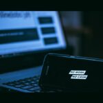 Laptop used for online activity representing tech support scams phishing and fraud warnings