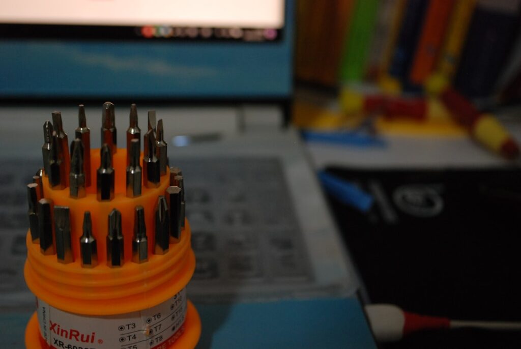 Precision screwdriver and repair tools for opening and servicing a PC