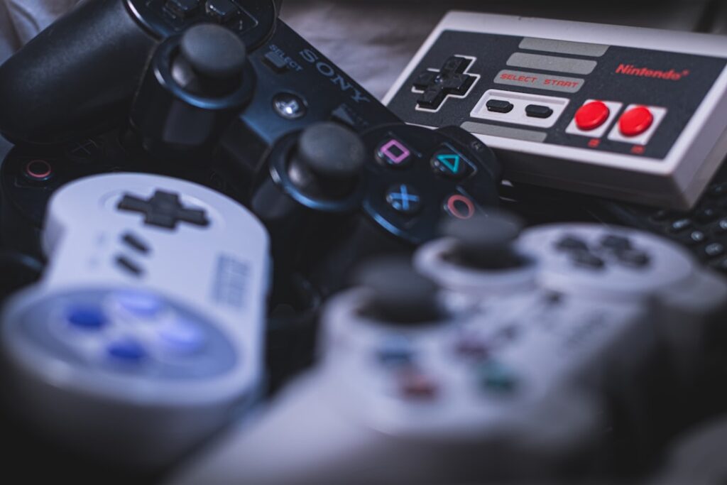 Game controllers used with a retro game stick and television setup