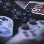 Game controllers used with a retro game stick and television setup