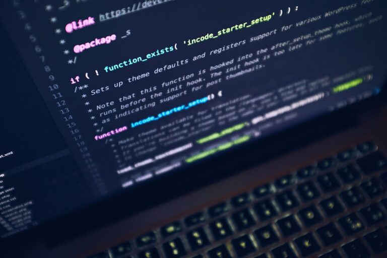 Laptop with code on screen representing Linux development with WSL 2 on Windows