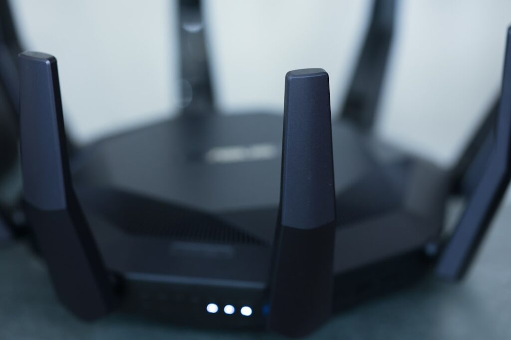 Wi-Fi router with antennas and status lights used for home network troubleshooting
