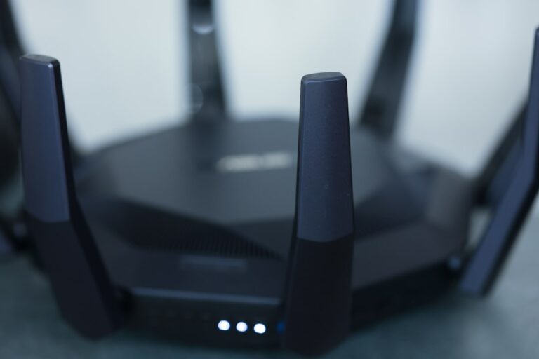 Wi-Fi router with antennas and status lights used for home network troubleshooting