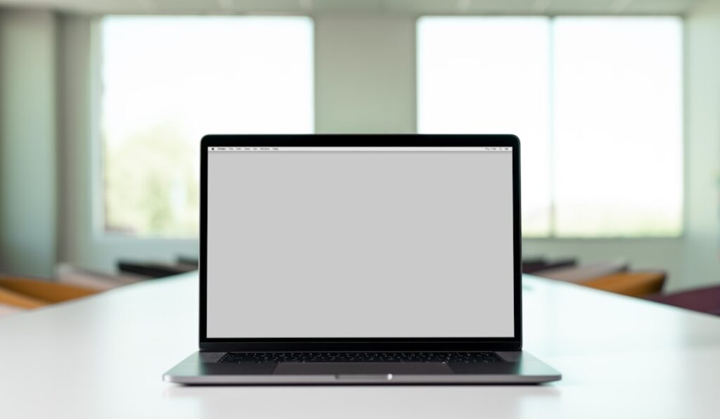 Laptop workspace used for Windows 11 performance troubleshooting