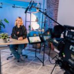 YouTube creator studio with camera lighting and production equipment